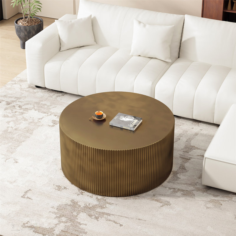 Table basse ronde moderne avec fabrication robuste et motif à rayures ondulées unique pour les salons et les chambres