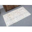 Tapis turc floral fabriqué à la main avec des teintes pastel douces pour une élégante décoration intérieure