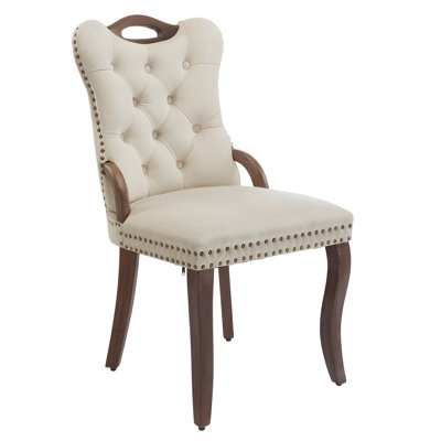 Ensemble de 2 chaises de salle à manger en velours beige, chaises de salle à manger rembourrées à oreilles avec garniture touffetée à la main, poignées en bois massif, garniture cloutée en cuivre rétro et pieds courbés en bois massif