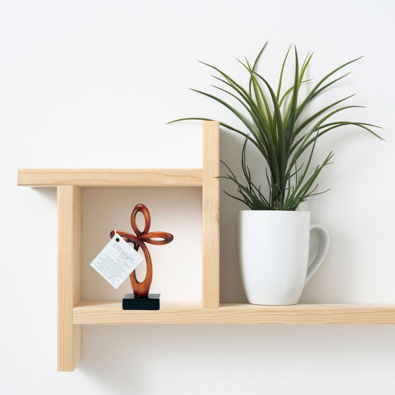 Figurine en résine et bois éternelles