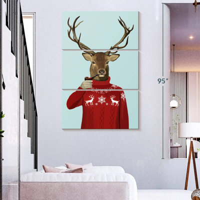 Cerf dans un chandail de ski Brampt