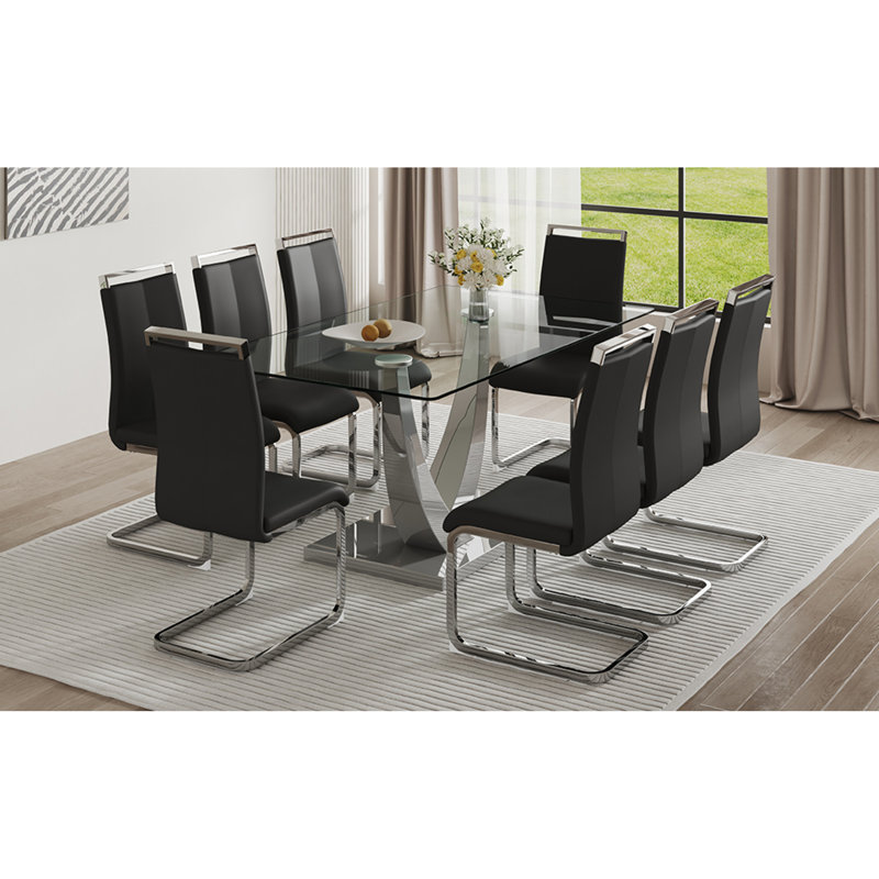 Ensemble de salle à manger contemporain en verre: plateau rectangulaire, structure en métal argenté, chaises en similicuir - design élégant pour les espaces modernes