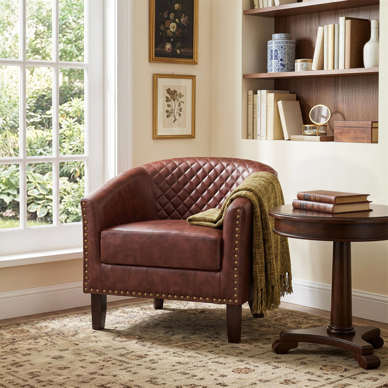 Petit fauteuil pivotant rembourré en similicuir capitonné rouge et brun avec garniture cloutée, Brun-rouge