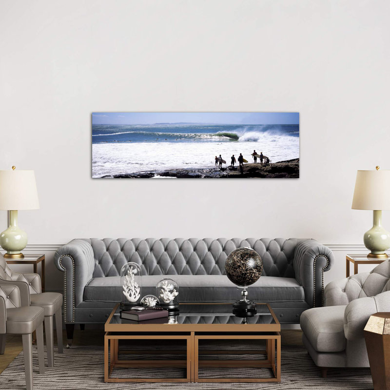 Silhouette Of Surfers Standing On The Beach, Australia by Panoramic Images - Wrapped Canvas Panoramic Print