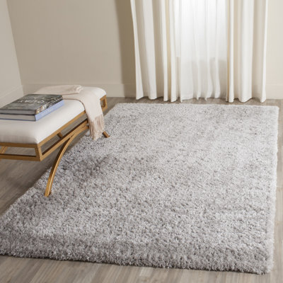 Tapis performance à poil long de couleur unie style indie Jaydn