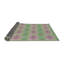 Tapis mauve/vert à motifs-1129641659