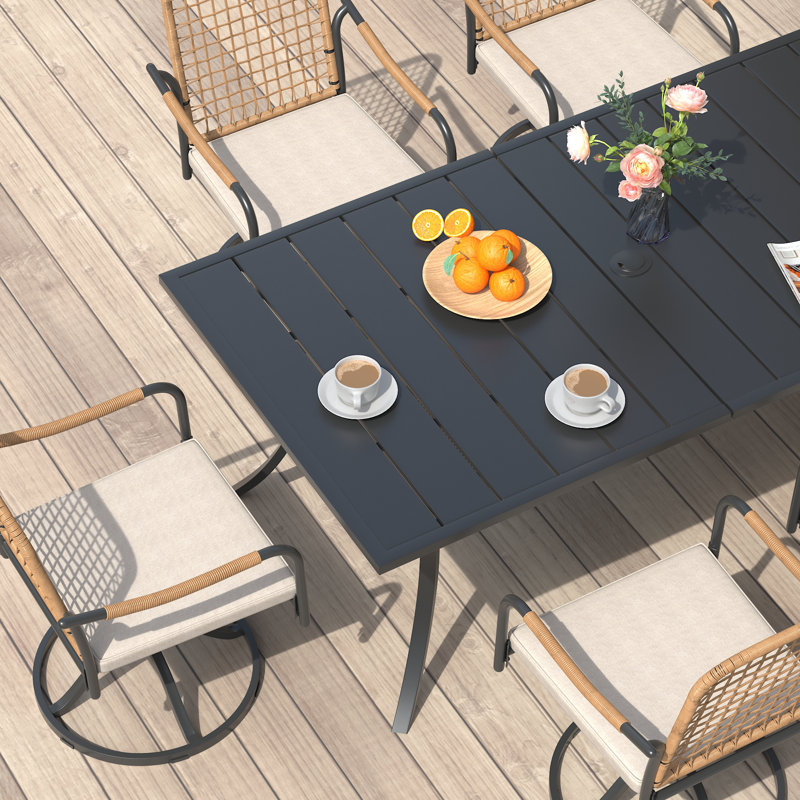 6 - Person 60'' L Outdoor Patio Dining Set With Cushioned Swivel Woven Rattan Chairs