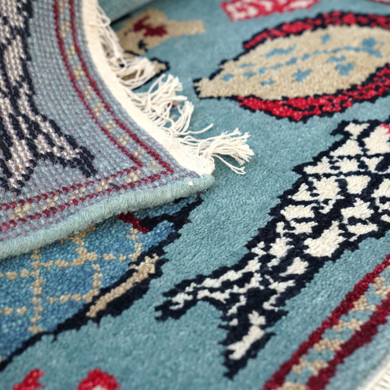 Selika Hand Woven Wool Area Rug