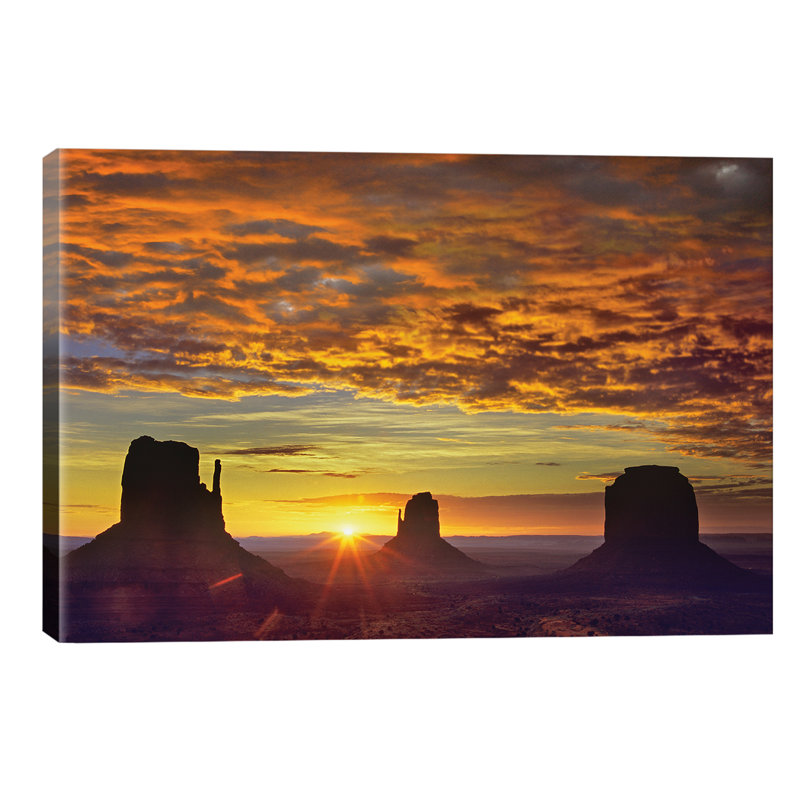 The Mittens And Merrick Butte At Sunrise, Monument Valley, Arizona by Tim Fitzharris - Wrapped Canvas Print