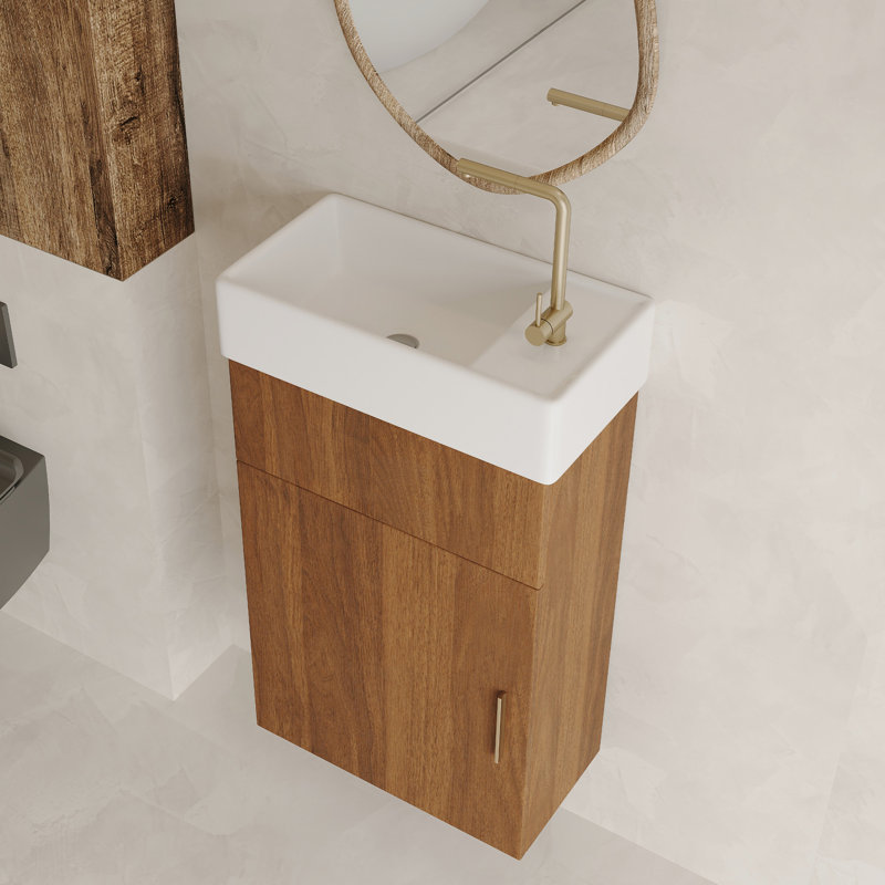 Meuble-lavabo suspendu de 42 cm (16,5 pouces) avec lavabo en céramique, porte et bonde réglable, idéal pour les petits espaces. Style moderne du milieu du siècle, rangement intégré, fermeture amortie.