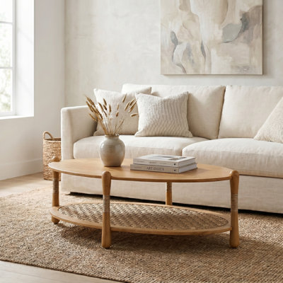 Arnkell Oval Wood Coffee Table With Seagrass Shelf