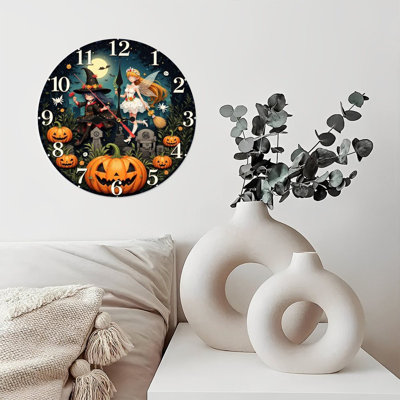 horloge d'Halloween sorcière fée citrouilles