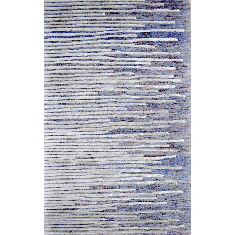Tapis bleu ciel/ivoire à la main