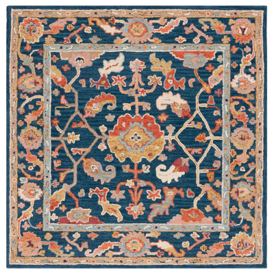 Menga Hand Tufted Wool Cotton Oriental Rug in Red/Navy