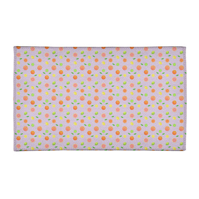 Tapis de fruits mauves agrumes