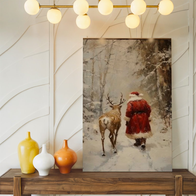 Toile «A Cosy Winter Scene Doté d'une figure dans un art mural rouge avec bordure blanche marchant le long d'un doux renne à travers l'art mural