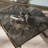 Tremmington Glass Top End Table with Storage