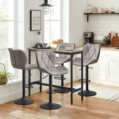 Abdur-Rasheed Swivel Upholstered Adjustable Height Counter Stool with Metal Frame