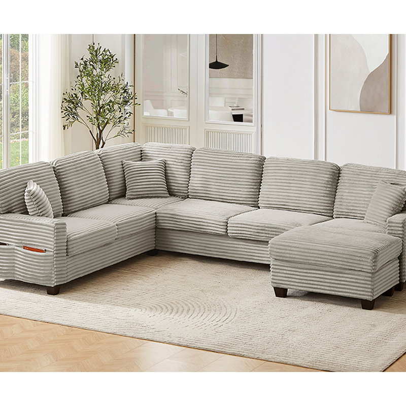Canapé modulaire polyvalent en forme de U avec repose-pieds mobile et poches de rangement latérales, parfait pour les salons modernes