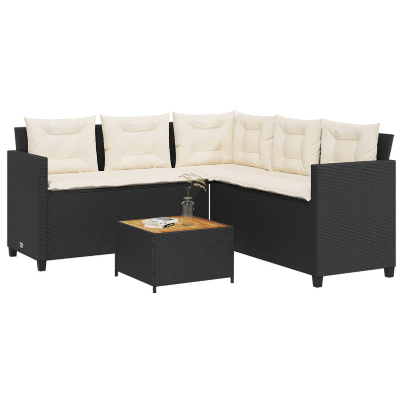 Canapé de patio en L en polyester noir Latitude Run® avec table et coussins