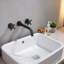 Robinet de lavabo de salle de bain mural en laiton massif noir mat avec deux poignées en croix