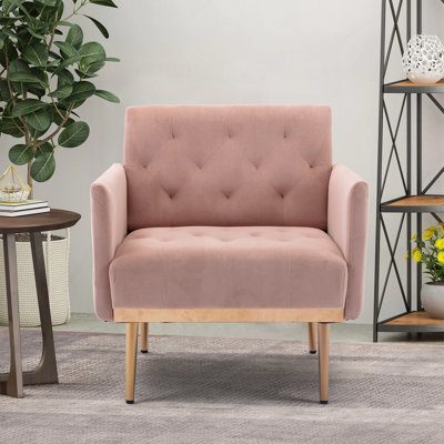 Fauteuil en velours avec pieds en métal