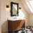 1-Light Black Gold Armed Jar Wall Sconce Glass Bell Shade Farmhouse Vanity Light for Kitchen & Bedroom
