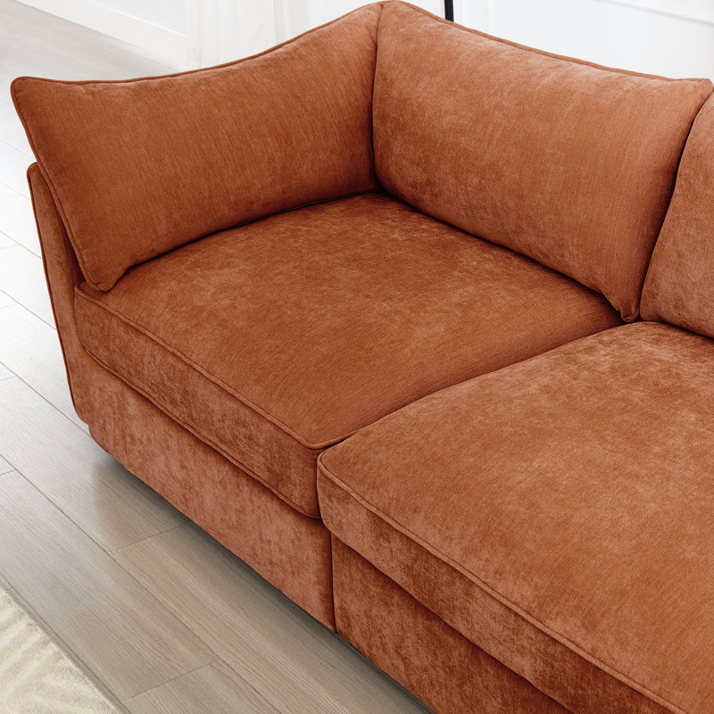 1 chenille orange avec passepoil exquis sur l'accoudoir, rangement caché dans le siège et confort de velours enveloppé, sous un matériau confortable