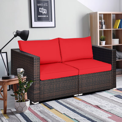 Malti 59" Wide Outdoor Wicker Loveseat with Cushions by Ebern Designs