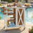 Foldable Outdoor Kitchen Island with Lockable Wheels, Storage, and Towel Rack for Patio and Compact Spaces-49414561