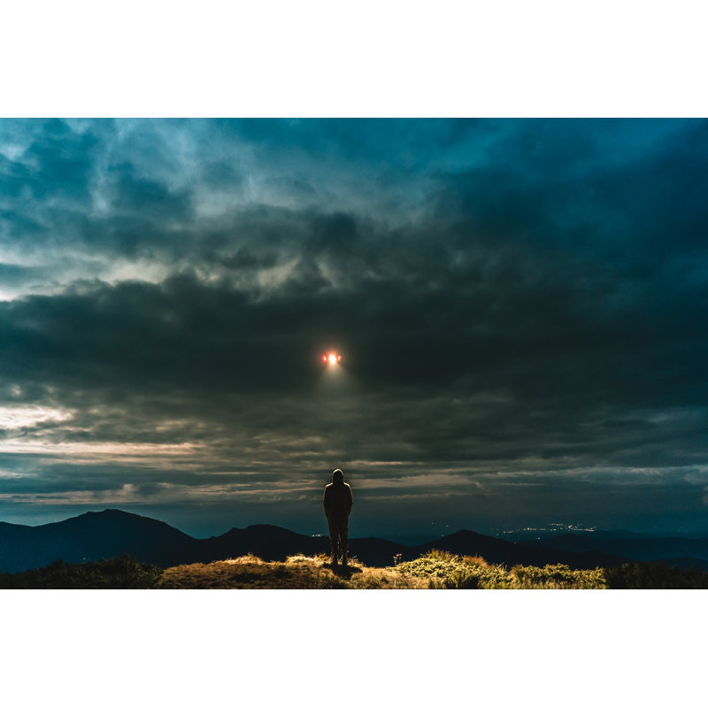 The UFO Shines On A Male Standing On The Mountain - Wrapped Canvas Print, 30cm H x 46cm W