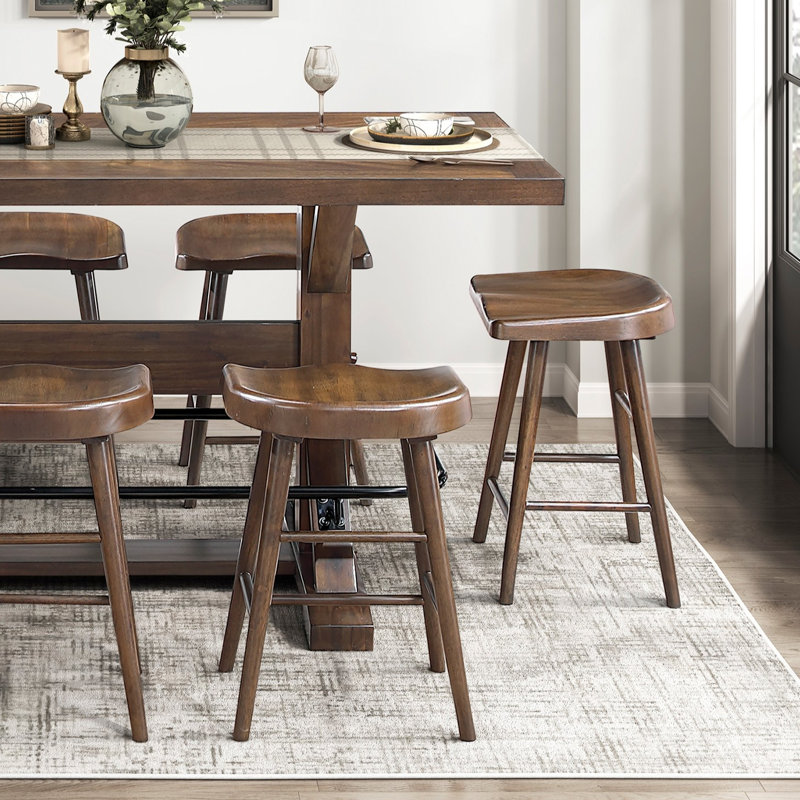 Ensemble de salle à manger 9 pièces, fini brun, table haute avec repose-pieds en métal et 8 tabourets. Structure robuste en bois. Mobilier de style classique et esthétique.