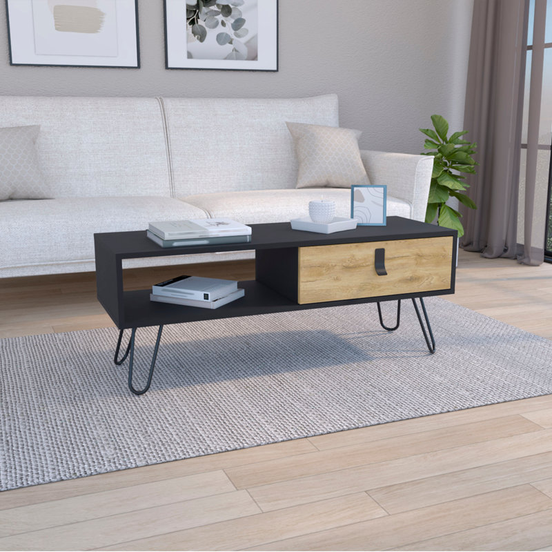 Table basse rectangulaire blanche / macadamia de 15 po de hauteur, 4 pieds en métal rétro, 1 cloison verticale pour les livres de créateurs et 1 tiroir pour ranger les petites choses.