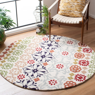 Kouerga Floral Handmade Tufted Beige Area Rug