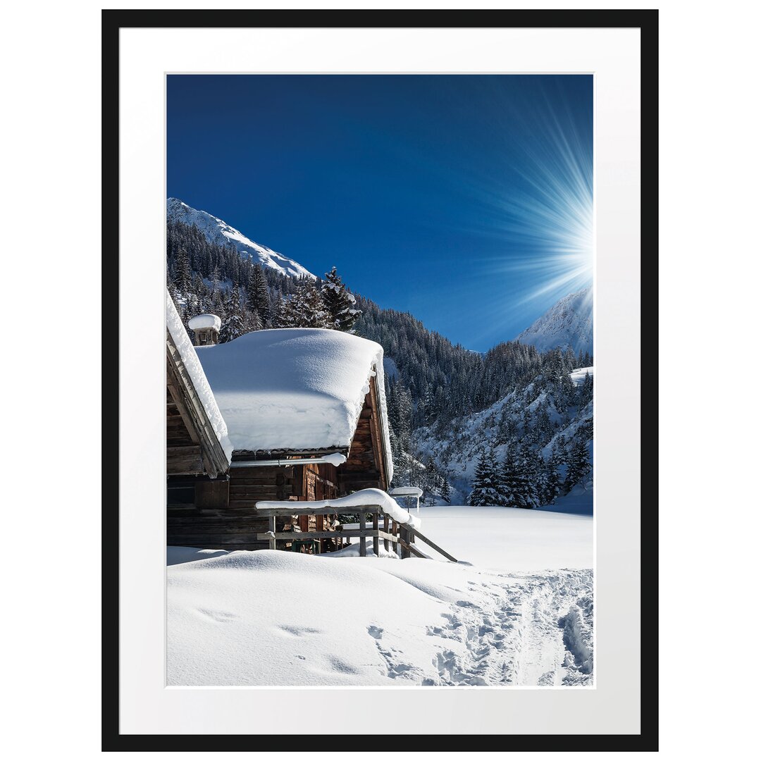 Gerahmtes Poster Verschneite Alpenhütte