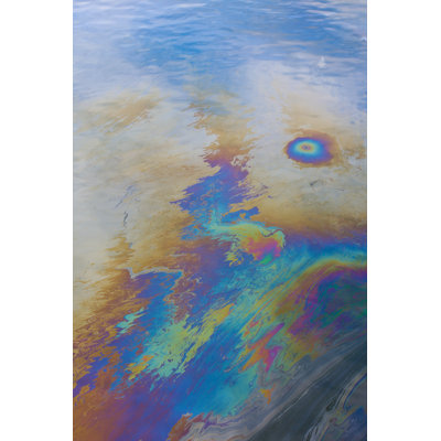 An Oil Slick Blemishing An Ocean - Wrapped Canvas Print