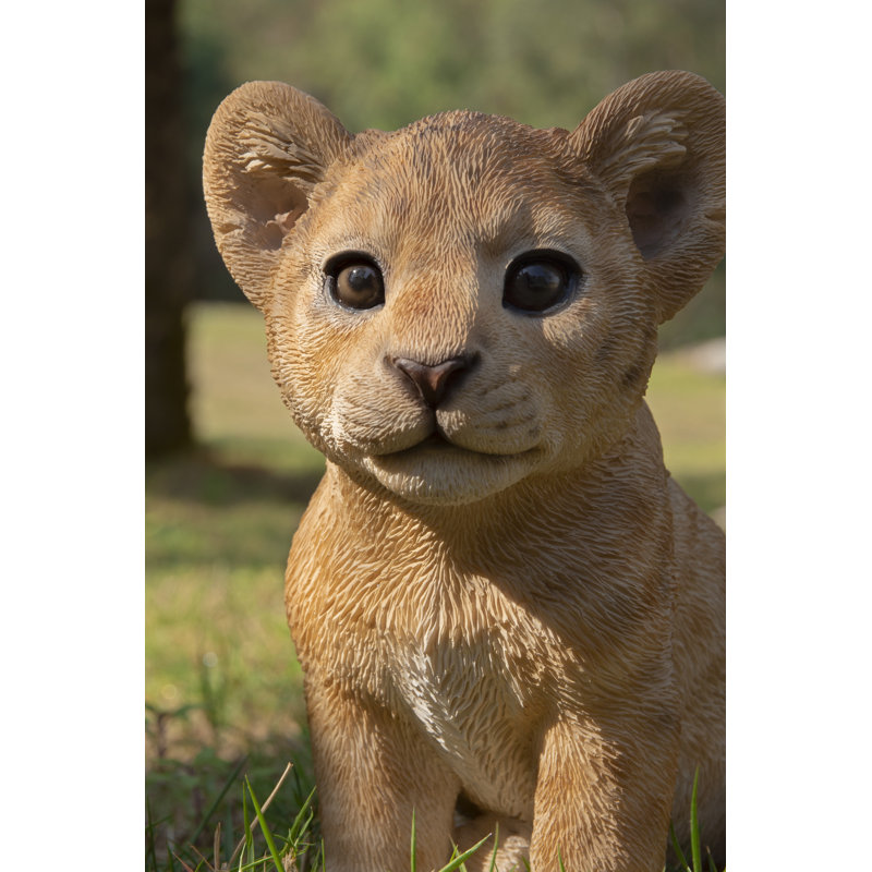 Sitting Lion Cub Statue