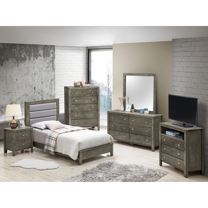 Lit simple gris élégant, offrant un environnement de sommeil confortable, gris polyvalent pour un sommeil réparateur