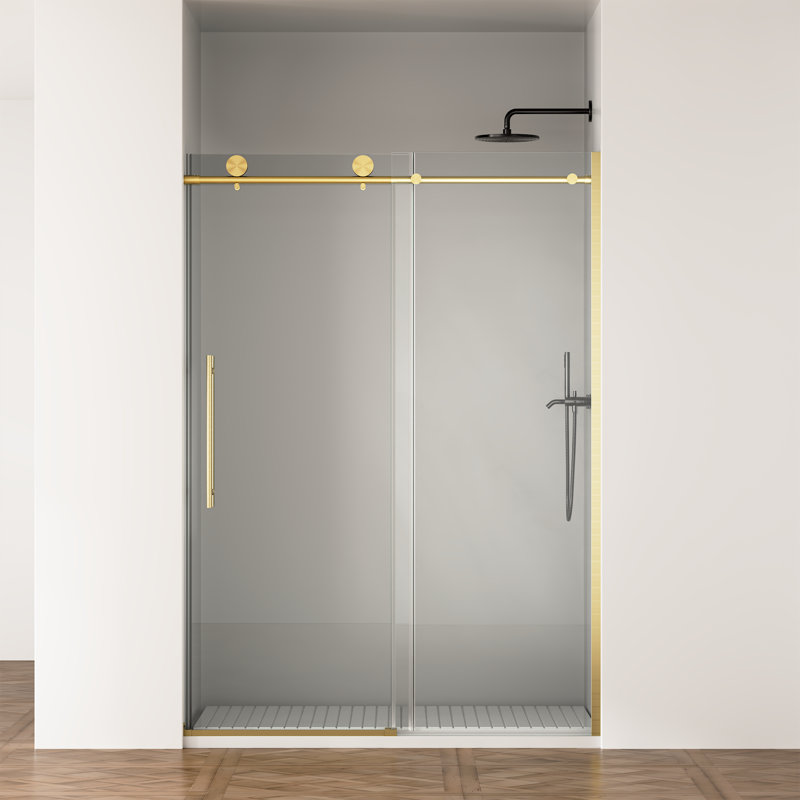 Les portes de douche et de baignoire sans cadre en or brossé sont douces et élégantes pour les salles de bain modernes
