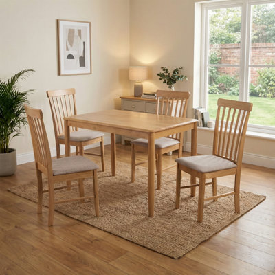 Ankrum 4 - Person Rubberwood Solid Wood Dining Set