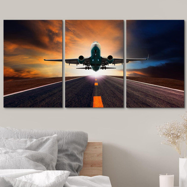 Jet Plane Flying Over Runway At Sunset On Canvas 3 Pieces Print