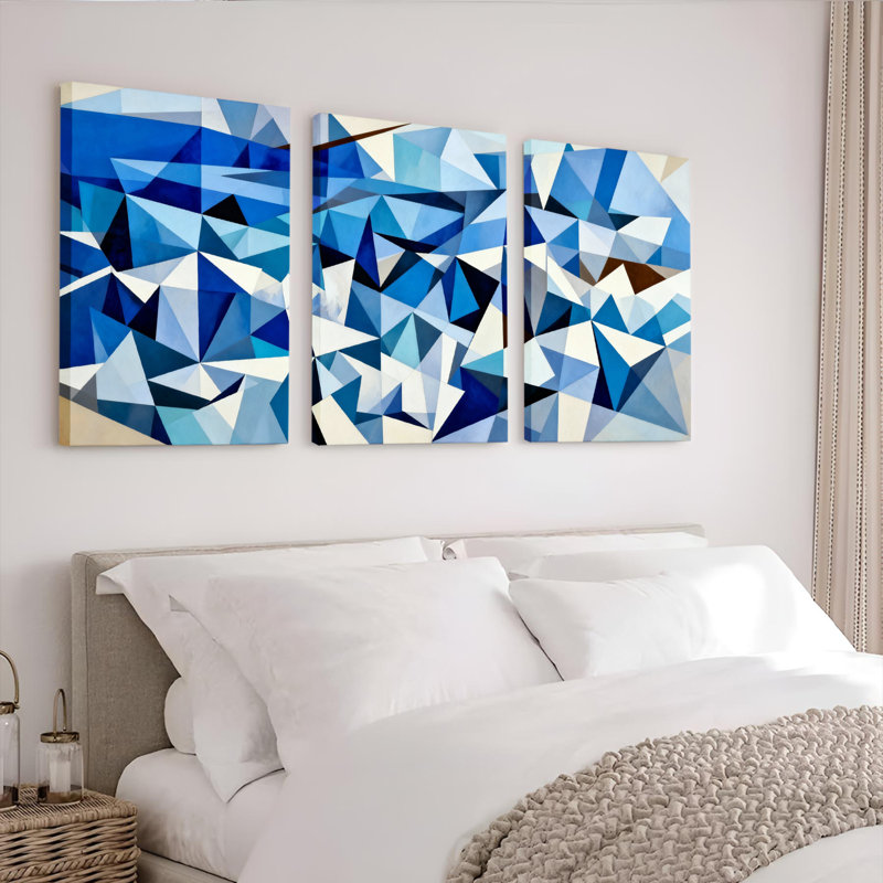 Ensemble de 3 tableaux abstraits géométriques à motifs de triangles bleus sur toile tendue, H 18 po x l 36 po