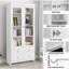 Bibliothèque blanche avec portes en verre