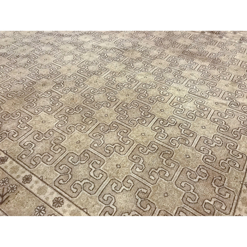 Tapis beige noué à la main de haute qualité
