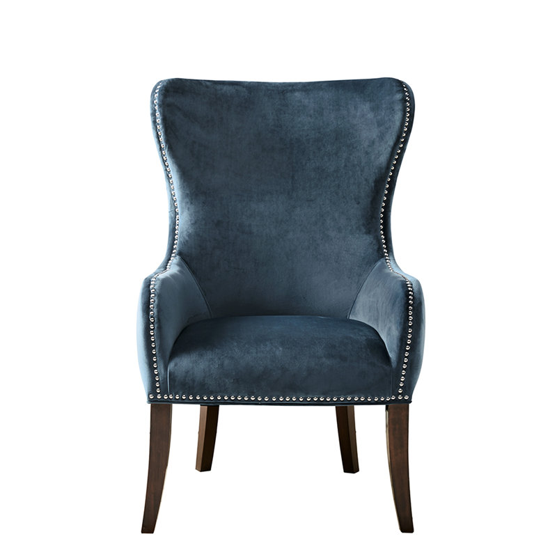 Fauteuil à finition capitonnée avec capitonnage bleu et accoudoirs à oreilles