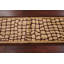 Tapis de couloir à motif géométrique brun