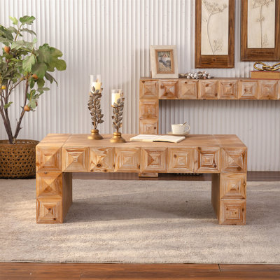 Table basse rectangulaire avec sculptures en relief géométriques 3D