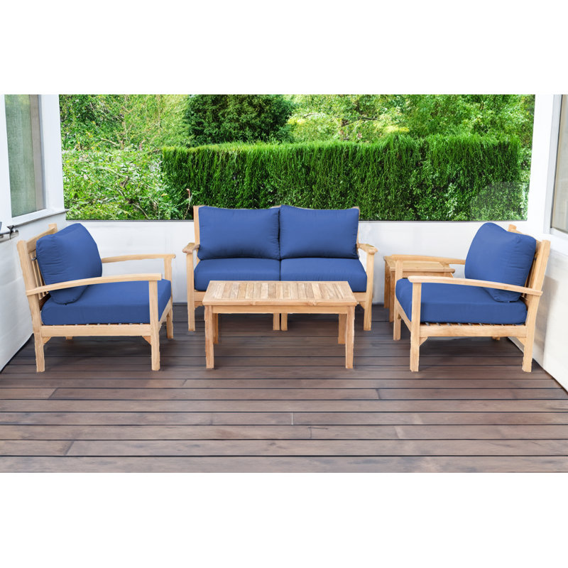 Ensemble de conversation avec causeuse en teck 5 pièces avec coussins Sunbrella Huntington, Saphir