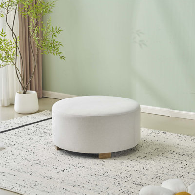 Repose-pieds rond en tissu avec pieds en bois, design minimaliste moderne pour le confort et la polyvalence