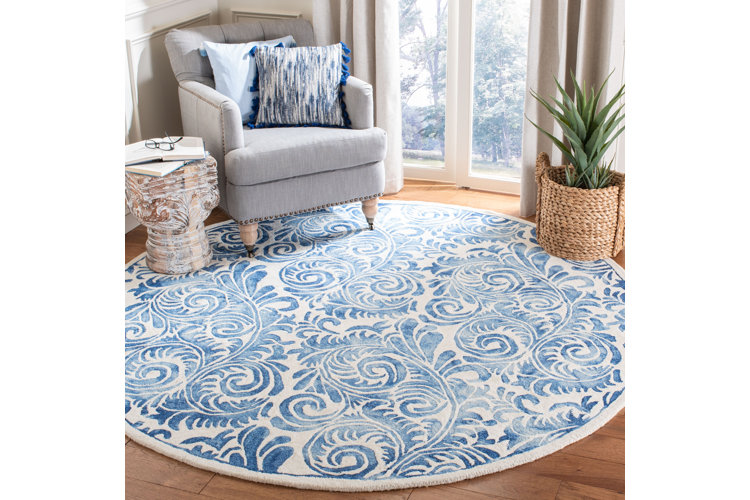 light blue and white circular paisley rug